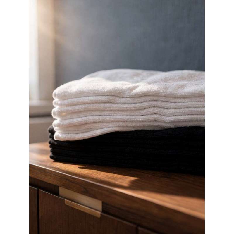 Toallas de peluquería blancas y negras